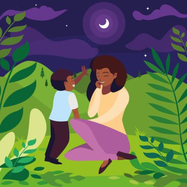 gece alanında oğlu ile güzel siyah anne