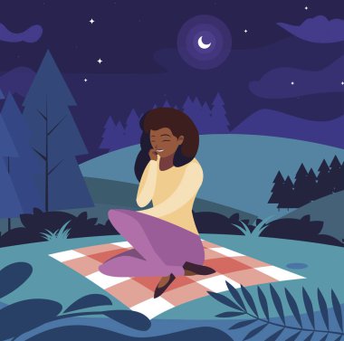 güzel siyah kadın park piknik gününde oturan