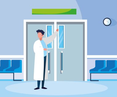 ameliyathane girişinde erkek tıp işçisi