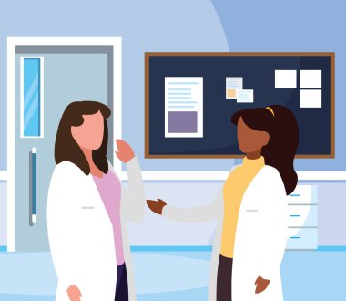 hastane koridorunda ırklar arası kadın tıp çalışanları