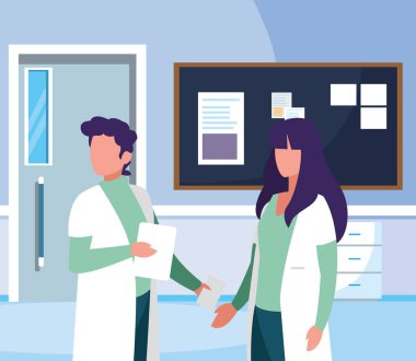 hastane koridorunda çift tıp işçileri