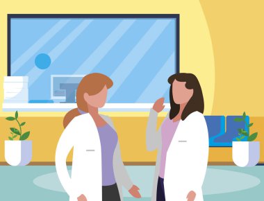 klinik resepsiyon sahnesinde kadın tıp çalışanları