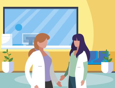 klinik resepsiyon sahnesinde kadın tıp çalışanları