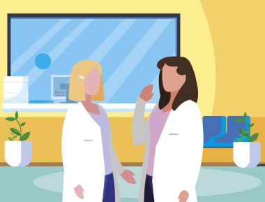 klinik resepsiyon sahnesinde kadın tıp çalışanları