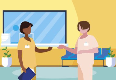 klinik resepsiyonda ırklar arası çift tıp çalışanları