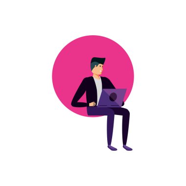 Genç adam dizüstü bilgisayar kullanıyor.