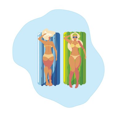 Yüzer yatak ile güzel kızlar suda yüzen