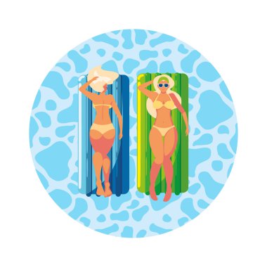 Yüzer yatak ile güzel kızlar suda yüzen