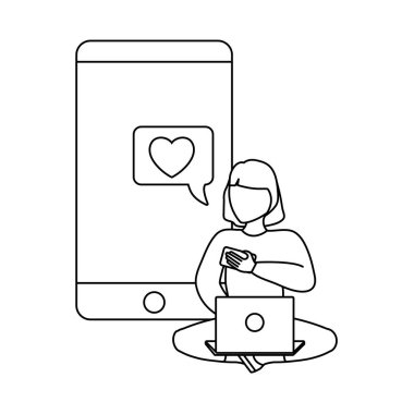 akıllı telefon ile dizüstü bilgisayar kullanarak oturan kadın