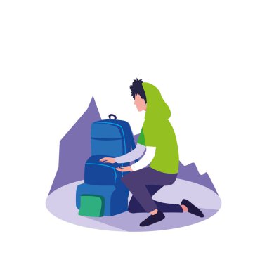 seyahat çantası ile oturan genç adam