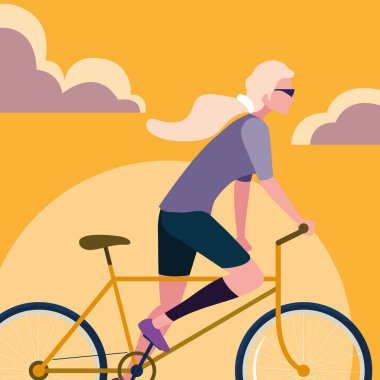 gökyüzü turuncu ile bisikletsürme genç kadın