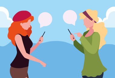 konuşan akıllı telefon kullanan iki kadın