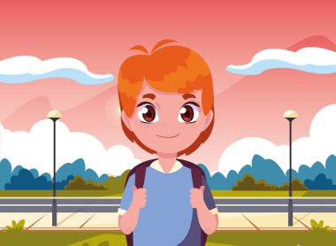 parkta çanta ile okul çocuğu