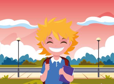 parkta çanta ile okul çocuğu