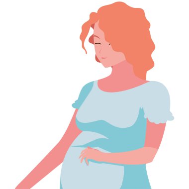 Hamile kadın karnına dokunuyor.