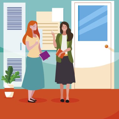 okul koridorunda ders kitapları ile kadın öğretmenler çift