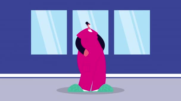 Женщина-врач в медицинской маске для covid19 в коридоре больницы — стоковое видео