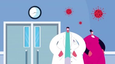 Doktor çift hastane koridorunda kovid19 için tıbbi maske takıyor.