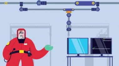 Fabrikada koruma amaçlı biyo-koruma kıyafeti giyen endüstriyel işçiler.