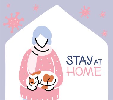 Kedili yaşlı bir kadın evde kalıyor, koronavirüs salgını.