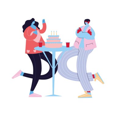 Maskeli çift ve doğum günü pastası