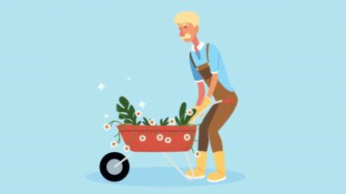 Adam el arabasıyla bahçe animasyonu yapıyor.