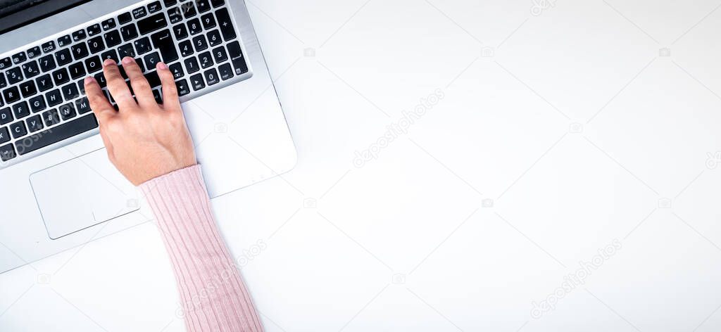 Woman's hand on computer, working on company and blogging, entrepreneur. With blank copy space for design or text