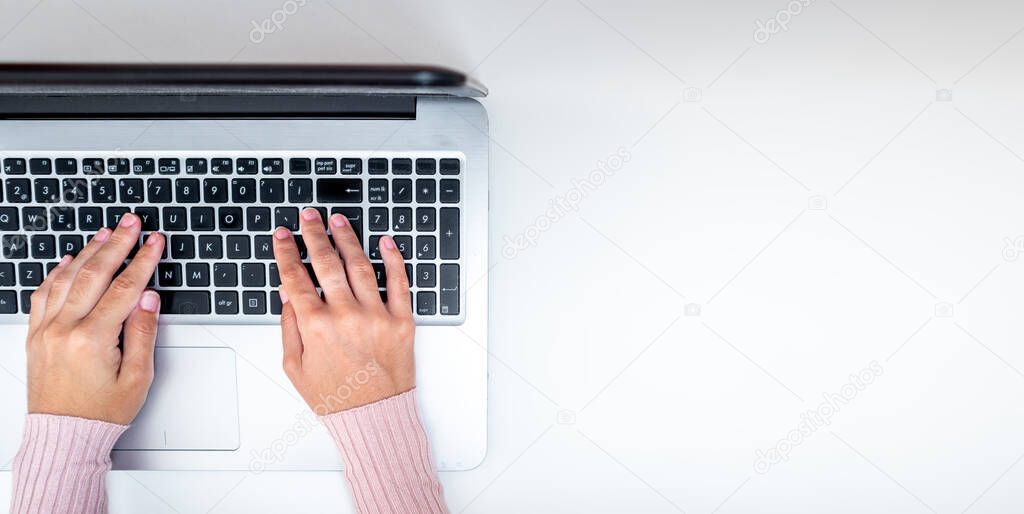 Layout of businesswoman hands typing on laptop. Entrepreneur working on a project, with blank copy space
