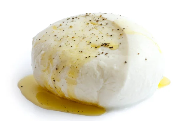 Single ball of mozzarella cheese covered with oil and pepper, is — Stock Photo, Image