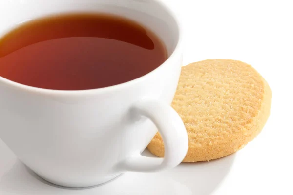 Detail einer weißen Keramiktasse Rooibos-Tee mit Shortbread bis — Stockfoto