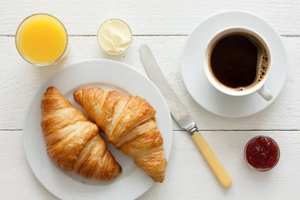 Coffee, orange juice and croissant breakfast. From above. — Stock Photo, Image