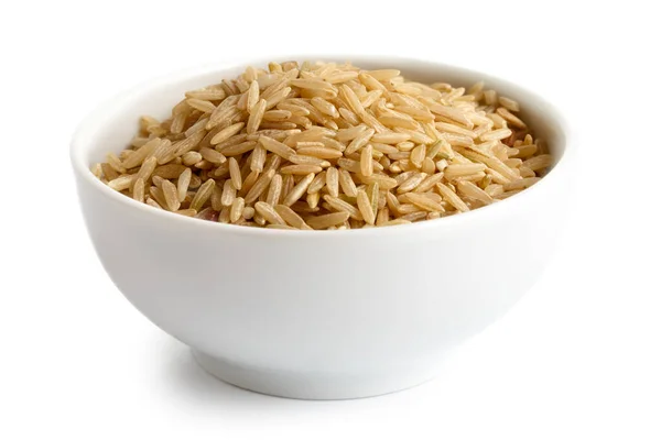 Bowl of long grain brown rice isolated on white. — Stock Photo, Image