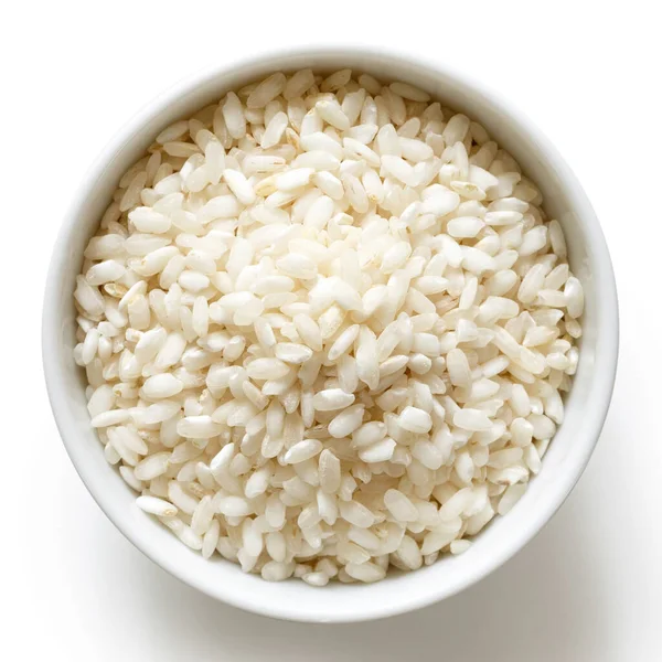 Bowl of Arborio short grain white rice isolated on white from ab — Stock Photo, Image