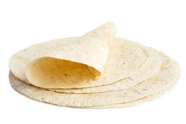 Pila de envolturas de tortilla y una envoltura plegada aislada en blanco . —  Fotos de Stock