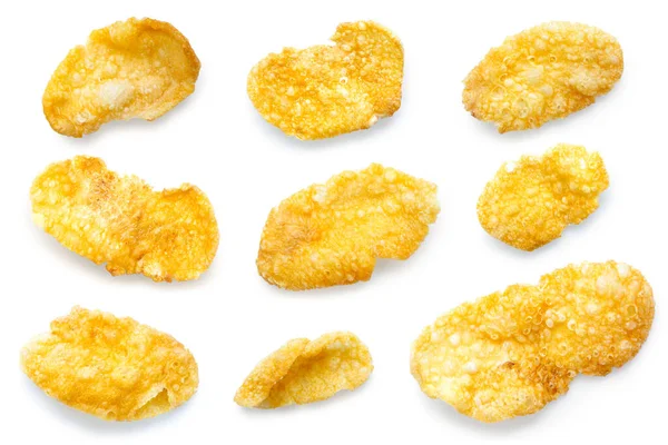 Verzameling van negen verschillende vormen cornflakes geïsoleerd op whit — Stockfoto