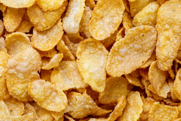 Background of dry cornflakes from above. — Stock Photo, Image