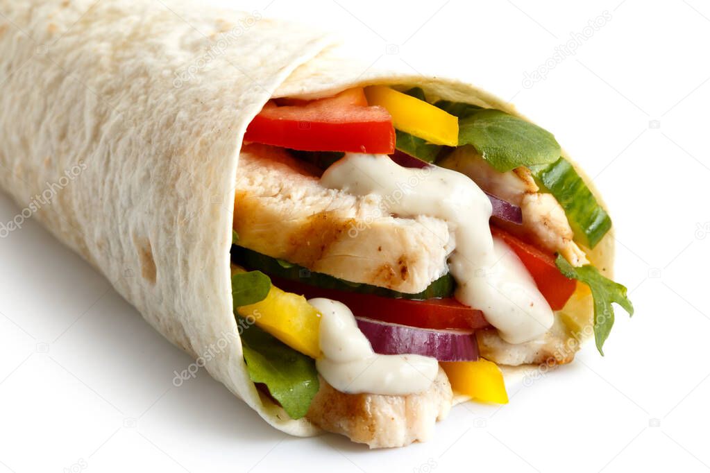 Detail of grilled chicken and salad tortilla wrap with white sau