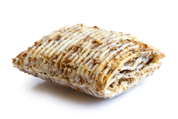 Single mini shredded wholegrain biscuit isolated on white. — Stock Photo, Image
