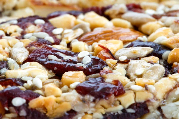 Detail of fruit, nut and seed bar with cranberries. — Stock Photo, Image