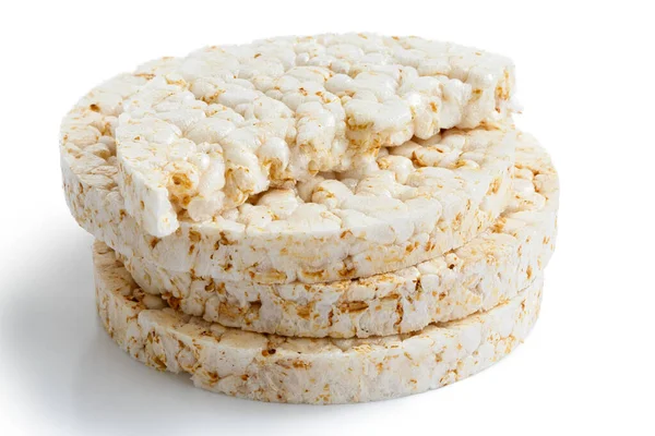 Stack of puffed rice cakes isolated on white. — Stock Photo, Image