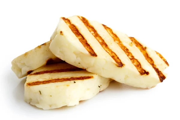 Three grilled slices of halloumi cheese isolated on white in per — Stock Photo, Image