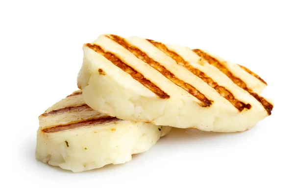Två grillade skivor halloumi ost isolerad på vitt i persp — Stockfoto