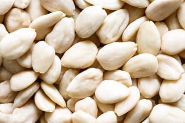 Soyulmuş bademlerin arka planı.