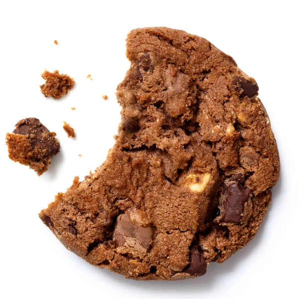 Sötétbarna csokis süti, hiányzó harapás morzsákkal — Stock Fotó