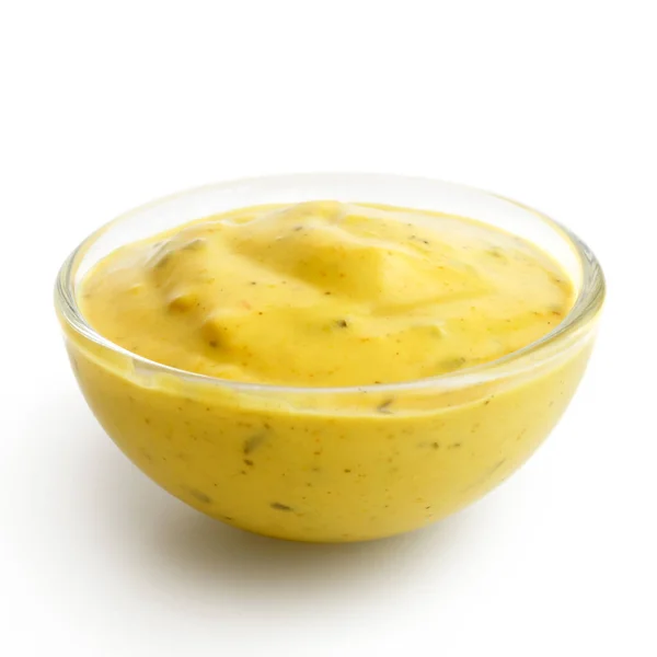 Small glass condiment bowl of  yellow curry sauce. Isolated in p — Stock Photo, Image