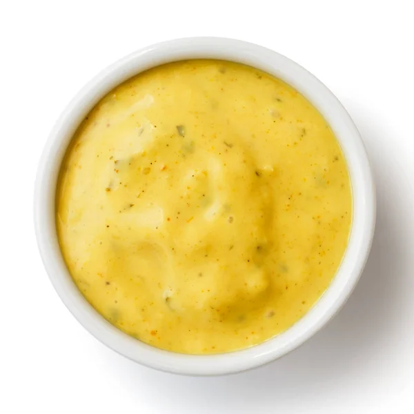 Small condiment bowl of yellow curry sauce. Isolated from above. — Stock Photo, Image