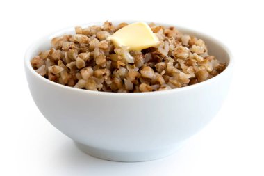 Beyaz seramik kasede yeşil maydanozlu karabuğday.