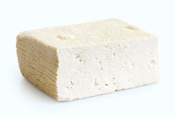 Bloco único de tofu branco isolado em branco . — Fotografia de Stock