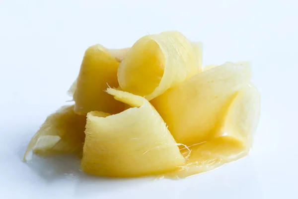 Heap of pickled ginger slices isolated on white. — Stock Photo, Image