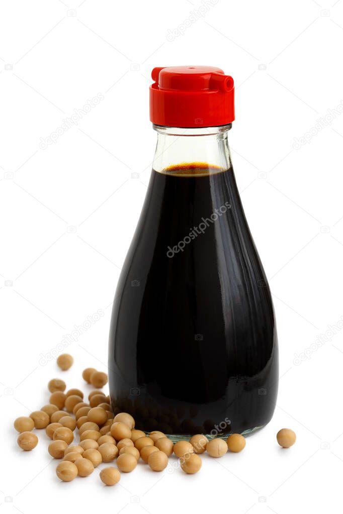 Glass bottle of soya sauce with red plastic lid isolated on whit